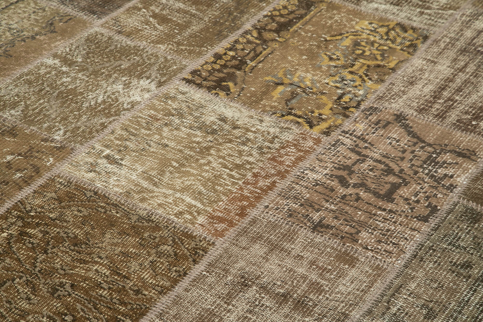 Hand-knotted turkish vintage 198 cm x 300 cm brown patchwork carpet