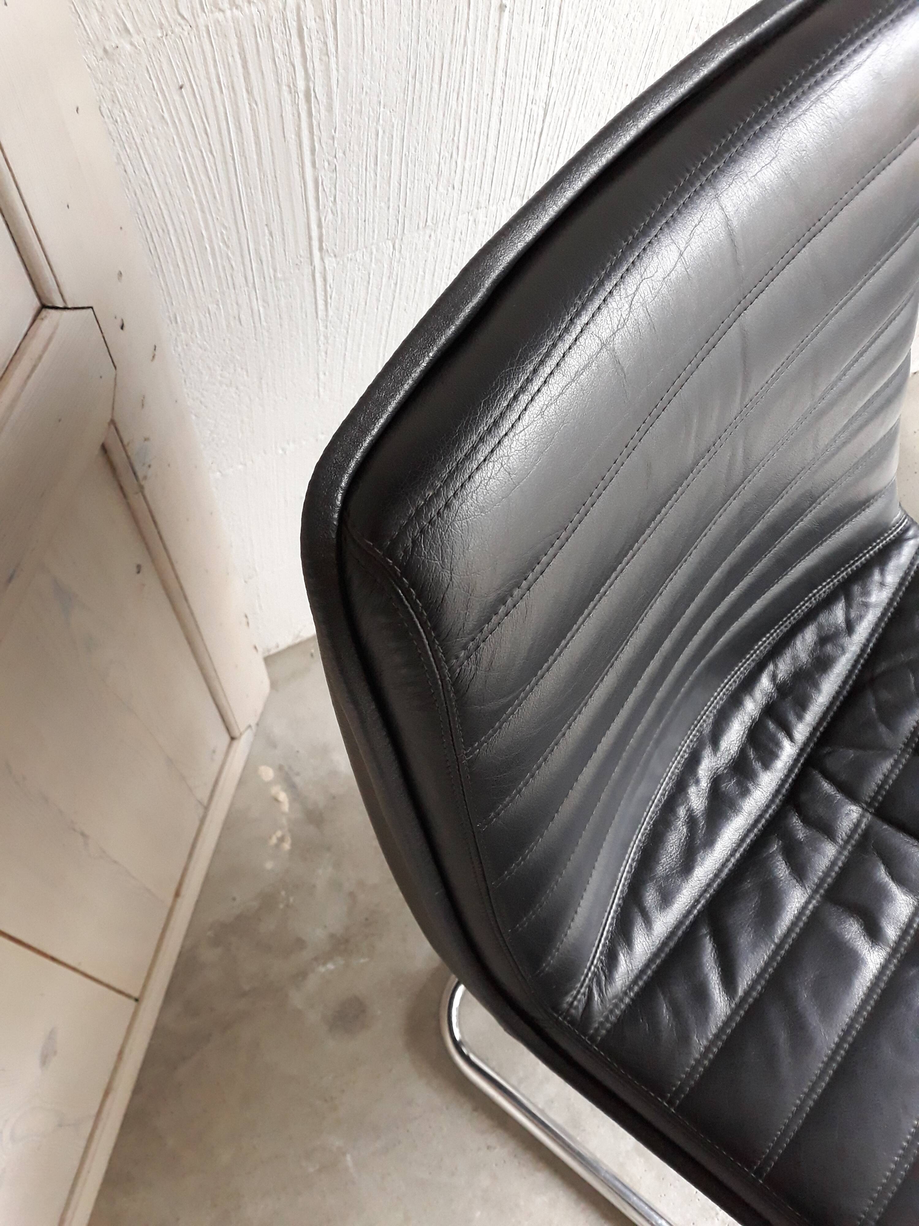 Vintage black leather armchair