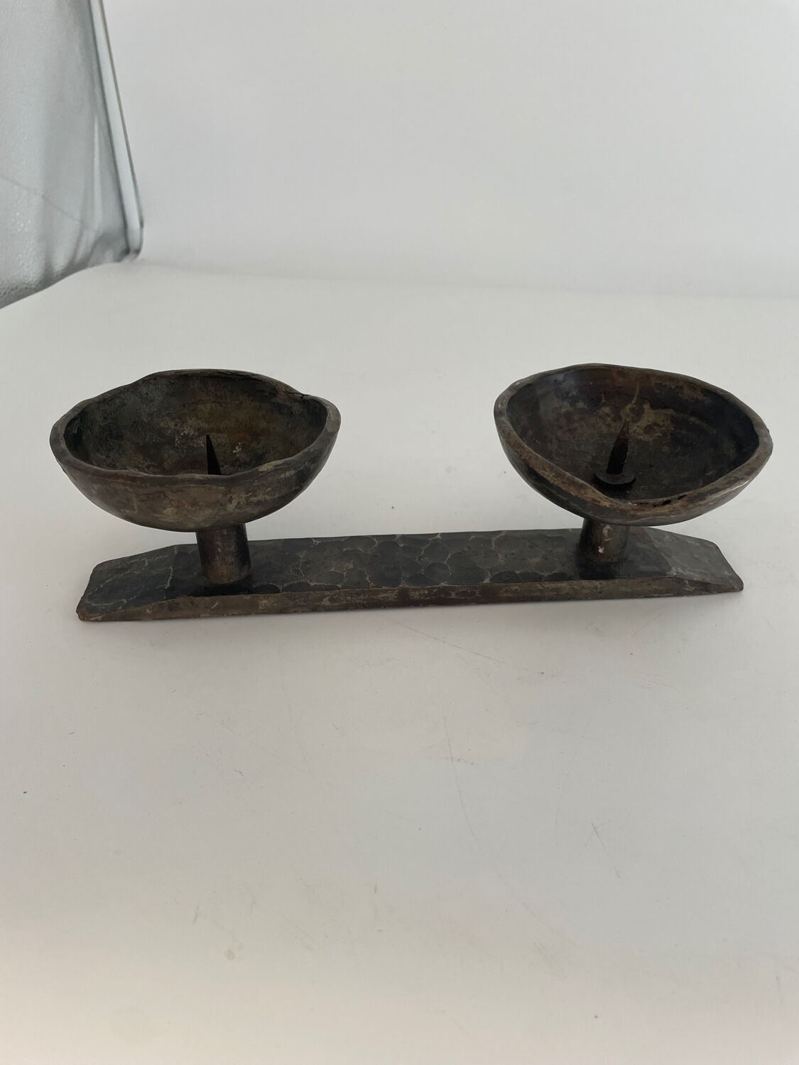 Wrought iron candlestick in brutalist style