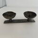 Wrought iron candlestick in brutalist style