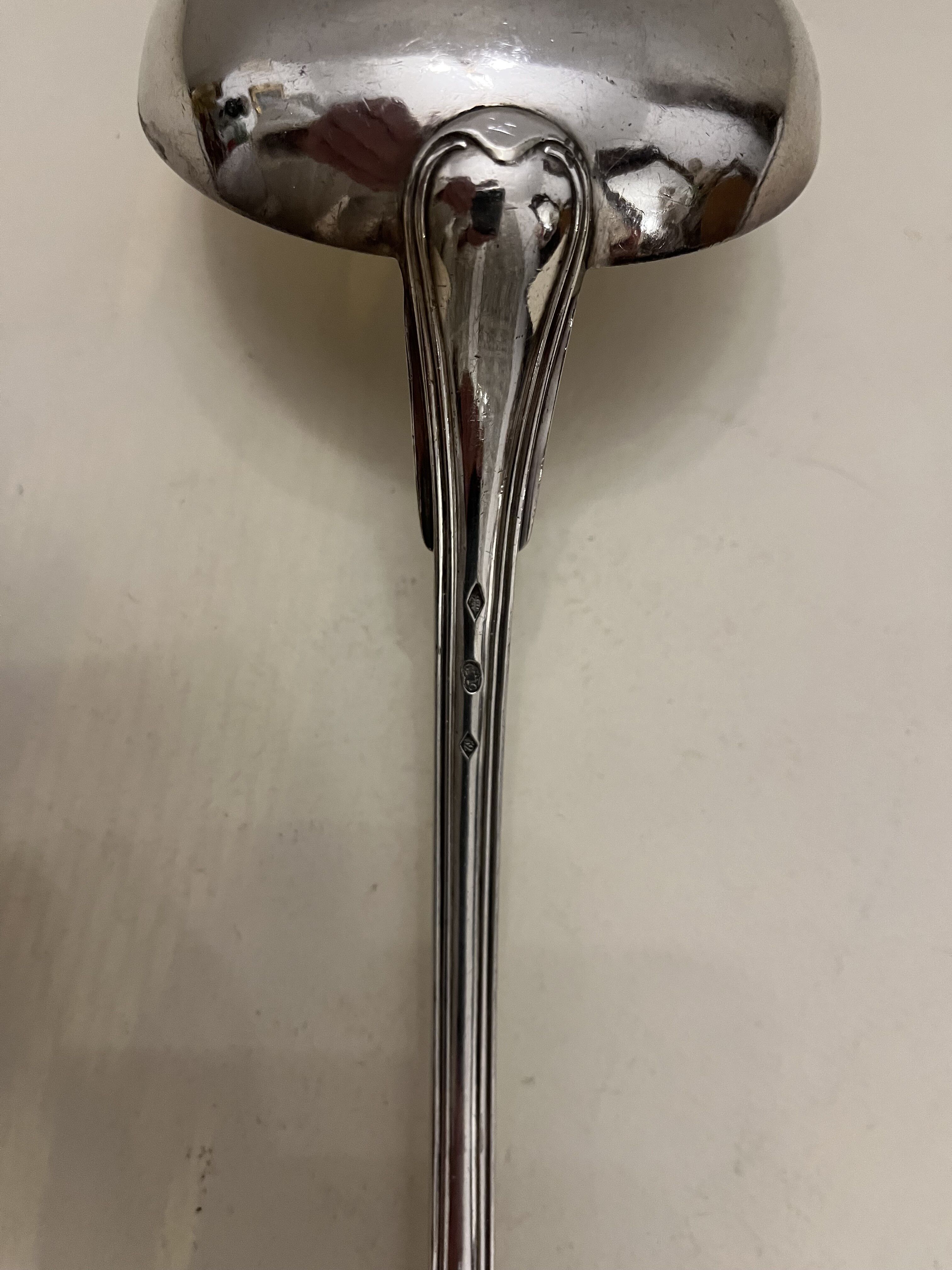 Silver metal ladle