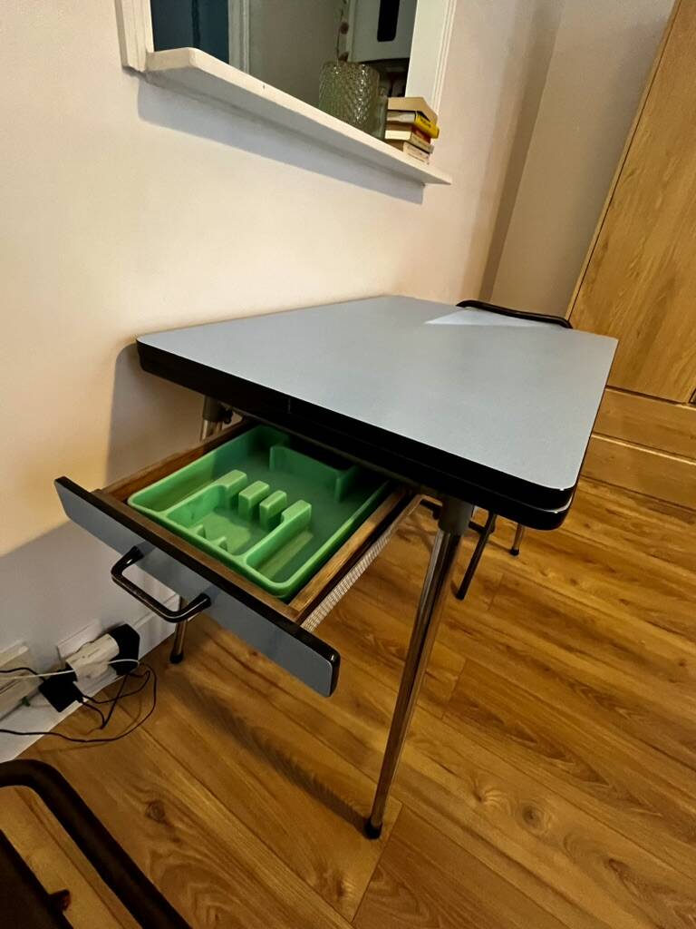 Extendable blue formica table