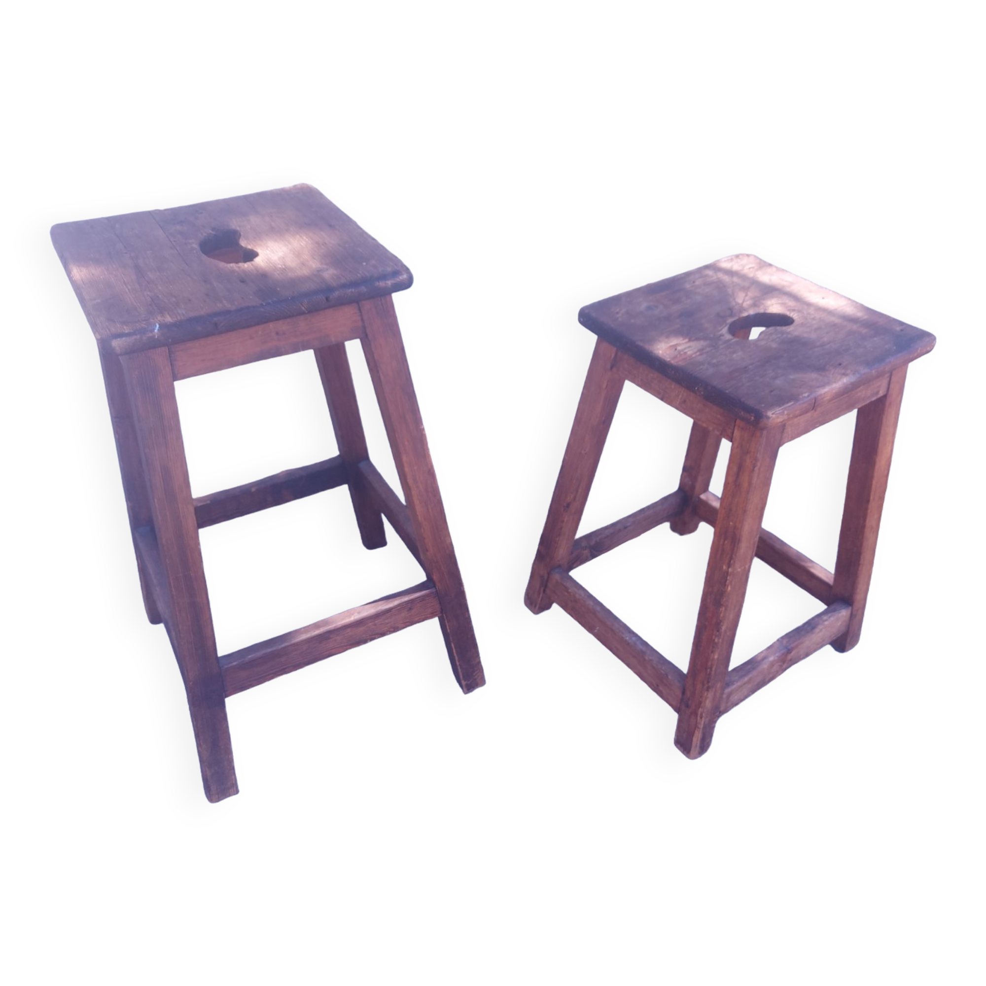 Two vintage wooden stools