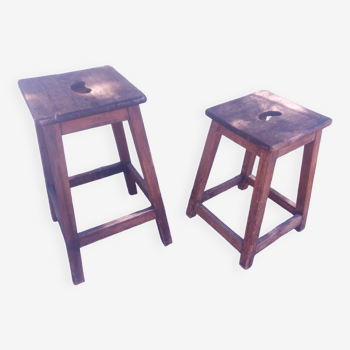 Two vintage wooden stools