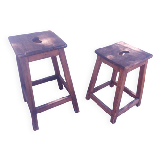 Two vintage wooden stools
