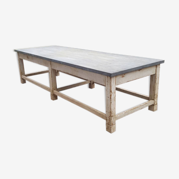 Wooden table with zinc top