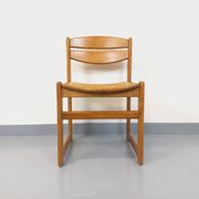 Vintage sleigh chair in beech wood and cane from the 70s and 80s
