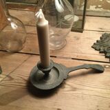 Pair of cast iron candle holders