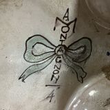 Earthenware planter with polychrome enamelled decoration on a blue background