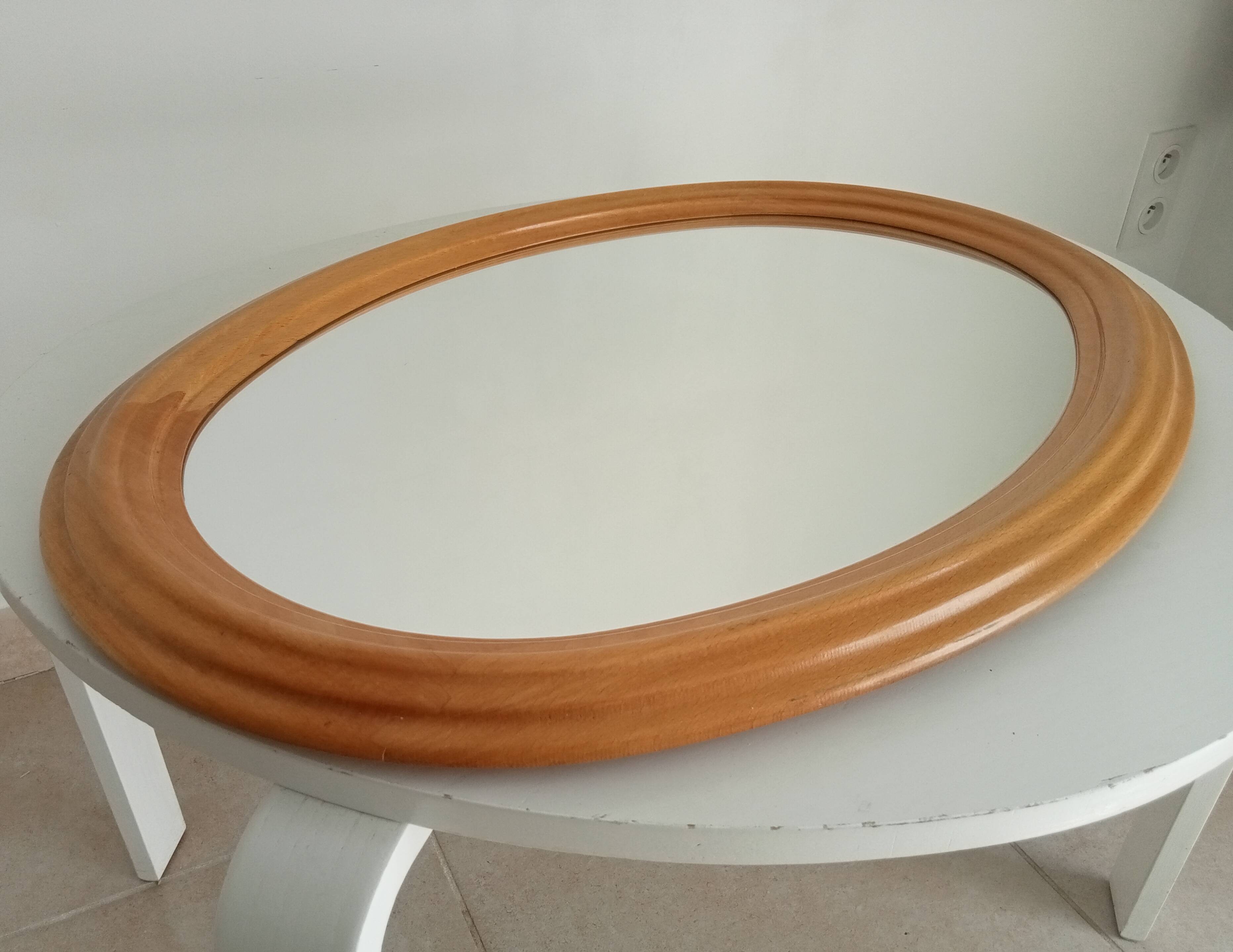 Vintage oval mirror in beech from the 70s/80s.