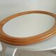Vintage oval mirror in beech from the 70s/80s.