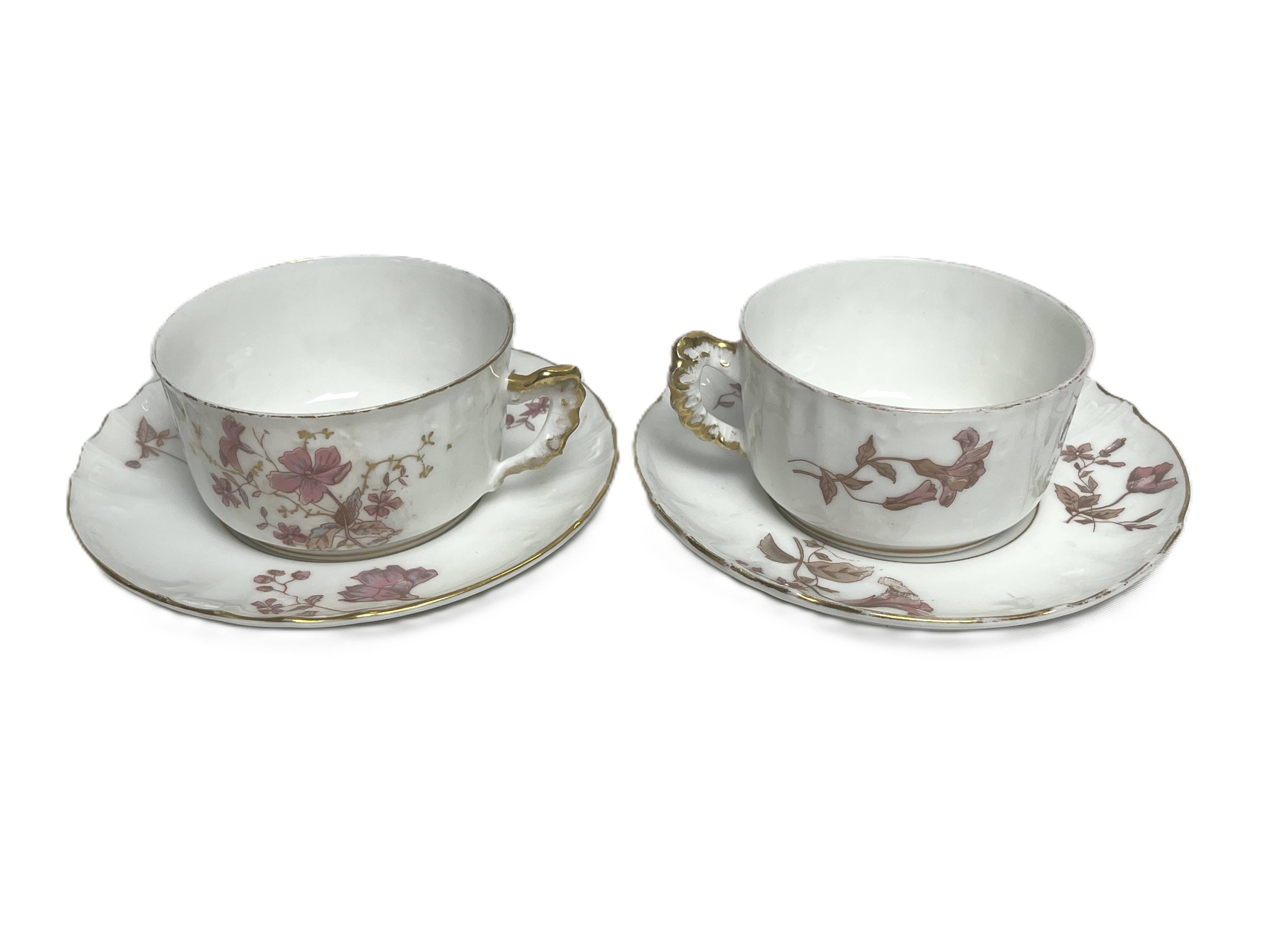 Two English porcelain teacups with floral decoration, 19th century