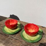 2 coffee cups red flowers and leaf in slurry shepherd