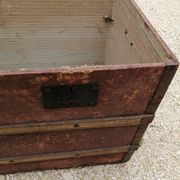 Old bombed travel trunk