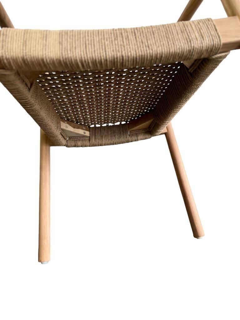 solid wood chair with woven seat and armrests