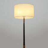 Floor lamp with a brass base and parchment shade, 1940s.