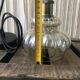 Pendant light with vintage globe