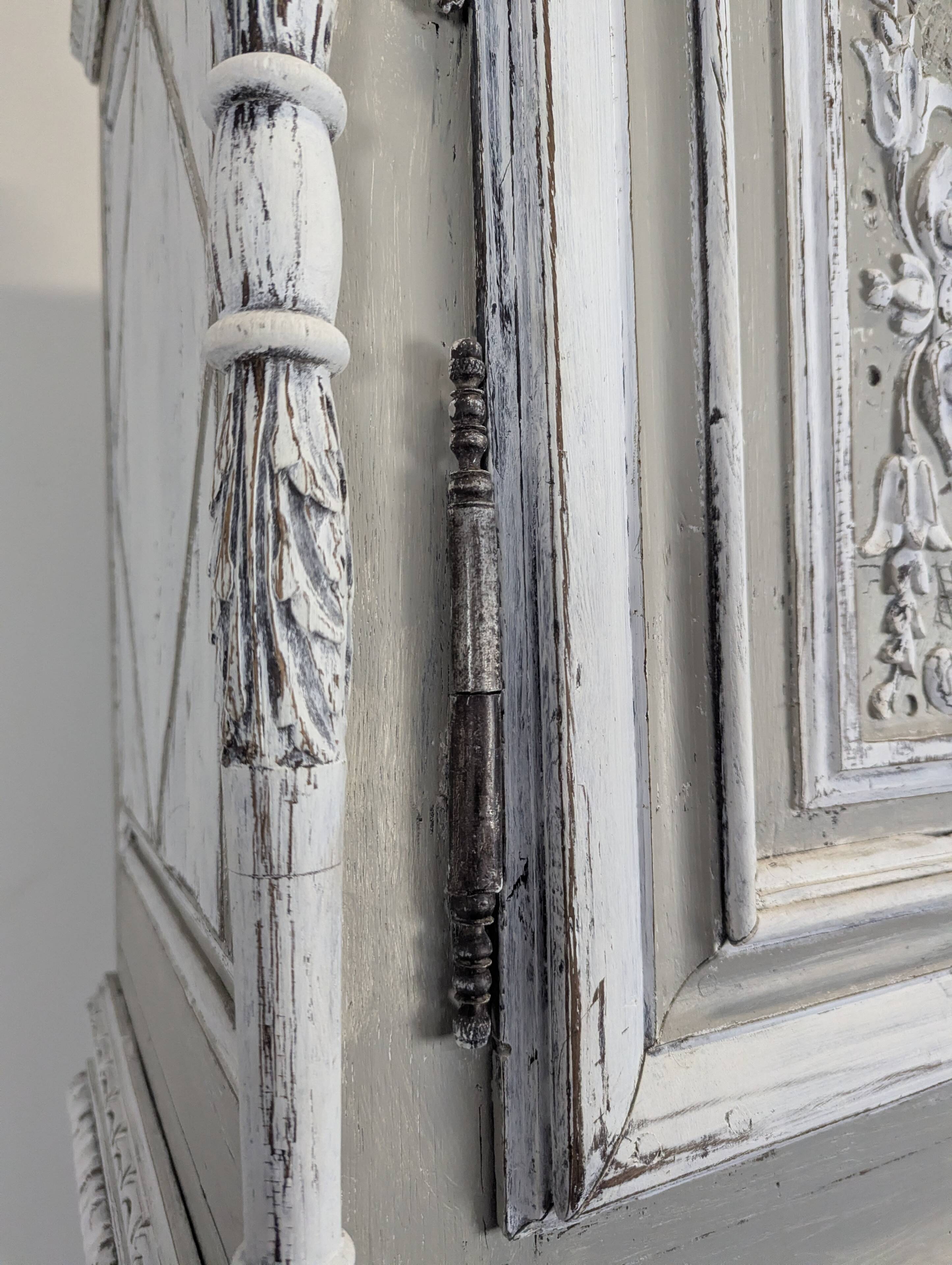 Standing man in Henri II style in patinated grey carved oak