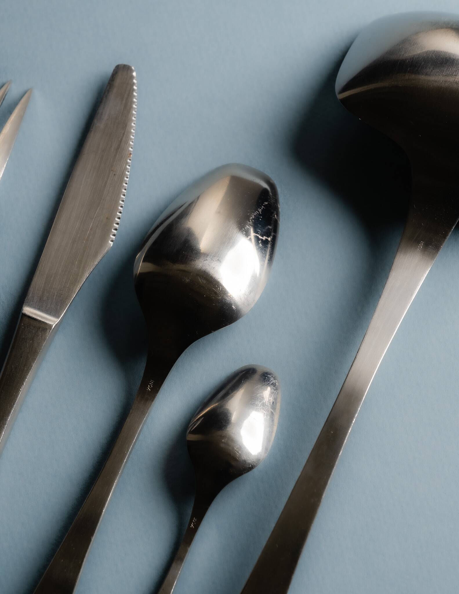 GUY DEGRENNE STAINLESS STEEL CUTLERY SET, 1970s