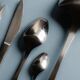 GUY DEGRENNE STAINLESS STEEL CUTLERY SET, 1970s