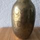 Chiseled brass vase
