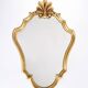 Large old mirror, golden shell, height 70 cm