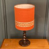 Mid-20th century turned wooden lamp with orange fabric lampshade