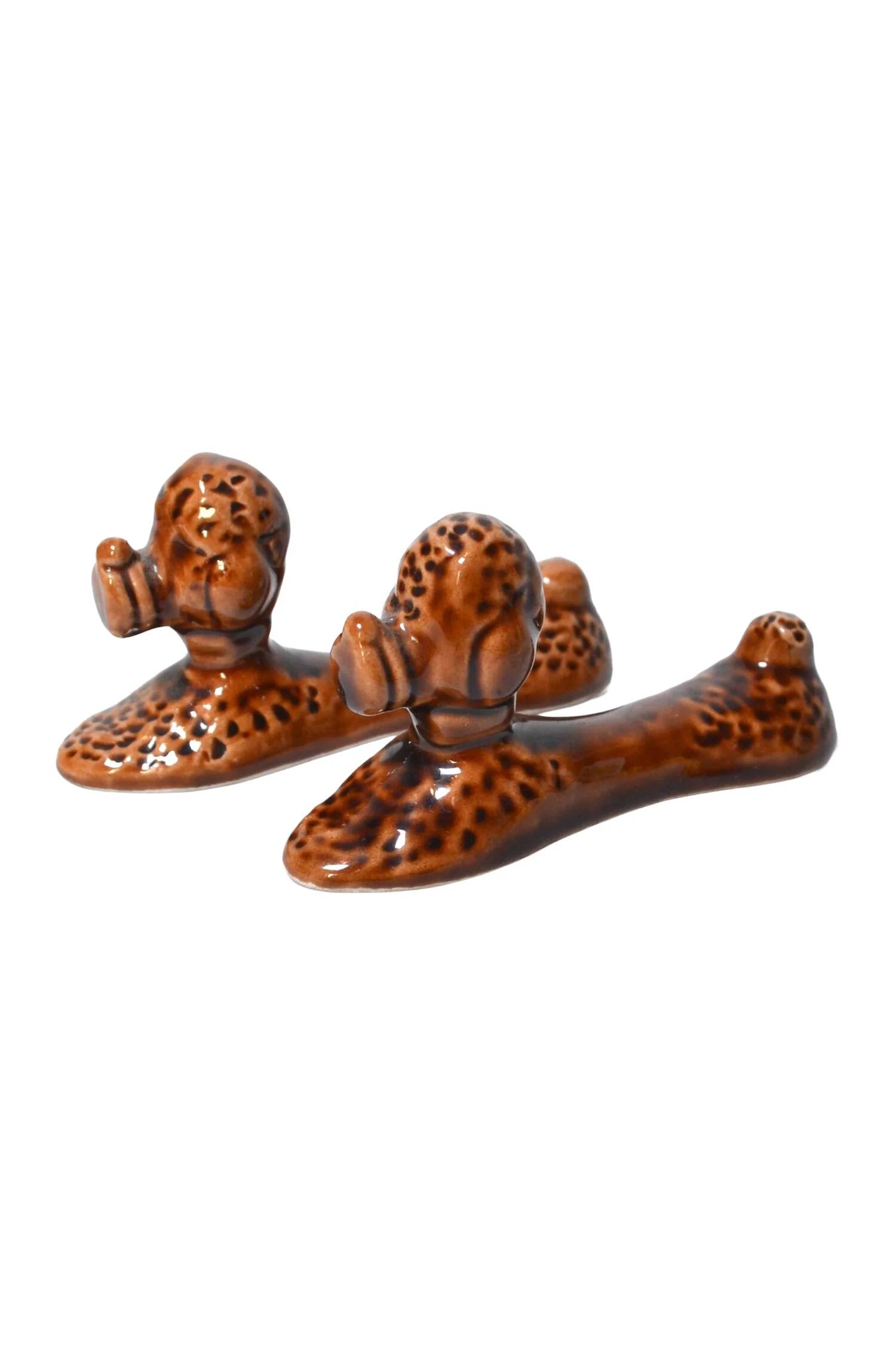 Vintage slip poodle knife holders