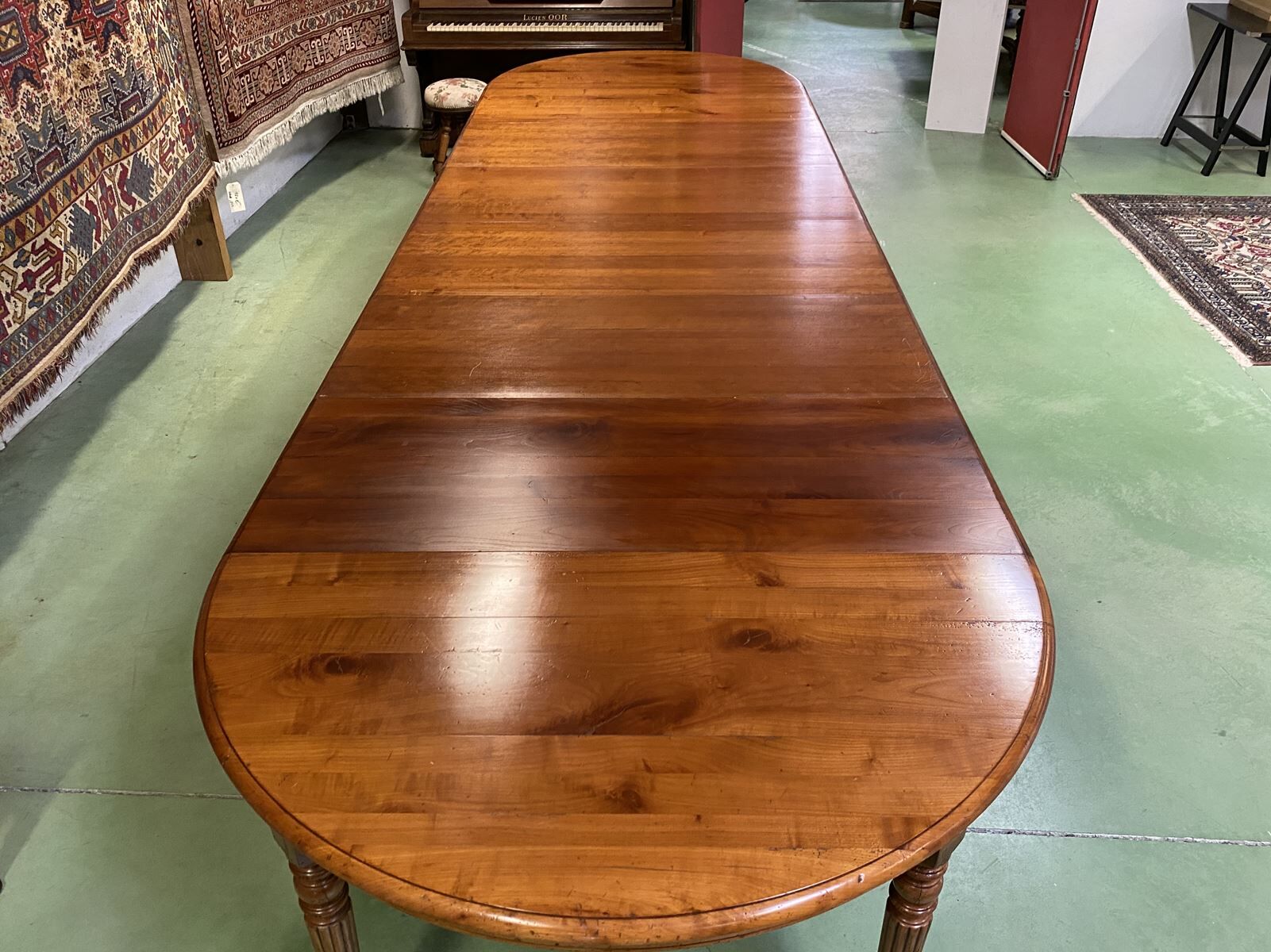 Louis Philippe round table 8 feet in cherry with 6 extensions