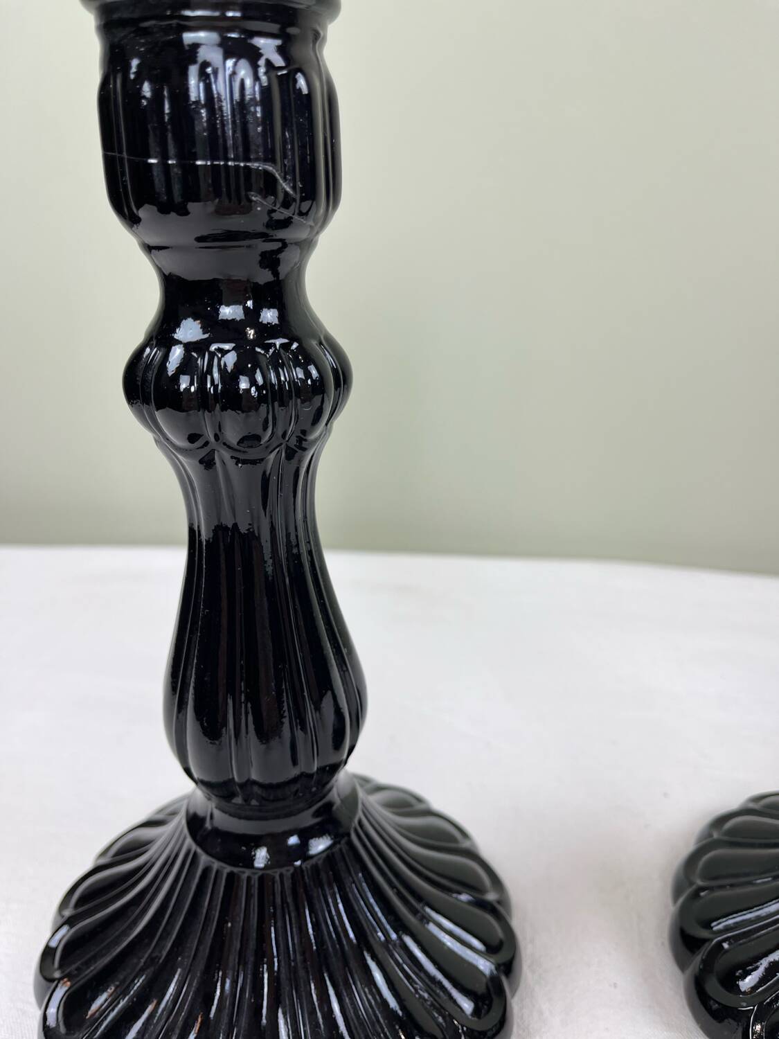 Pair of black opaline candlesticks