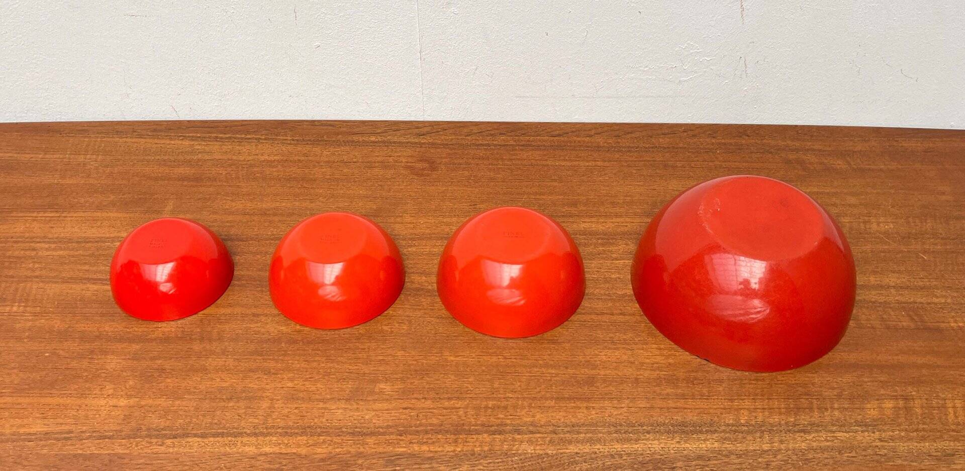Modern mid-century red enamel bowl sets by Kaj Franck for Finel, Finland, 1960s, set of 4.