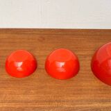 Modern mid-century red enamel bowl sets by Kaj Franck for Finel, Finland, 1960s, set of 4.