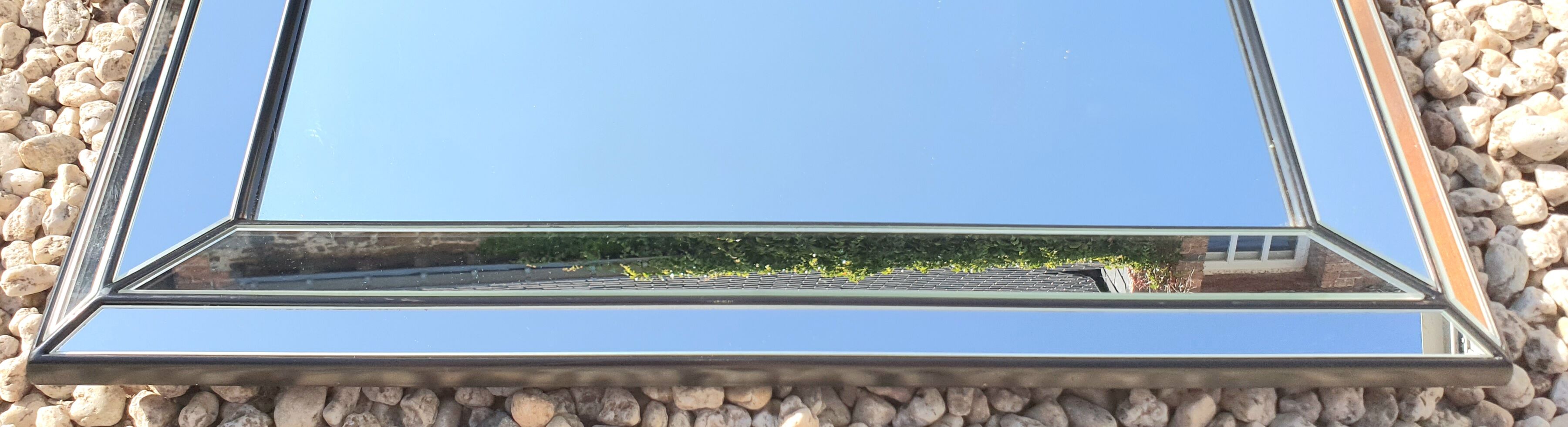 Vintage mirror deknudt with 70's parecloses