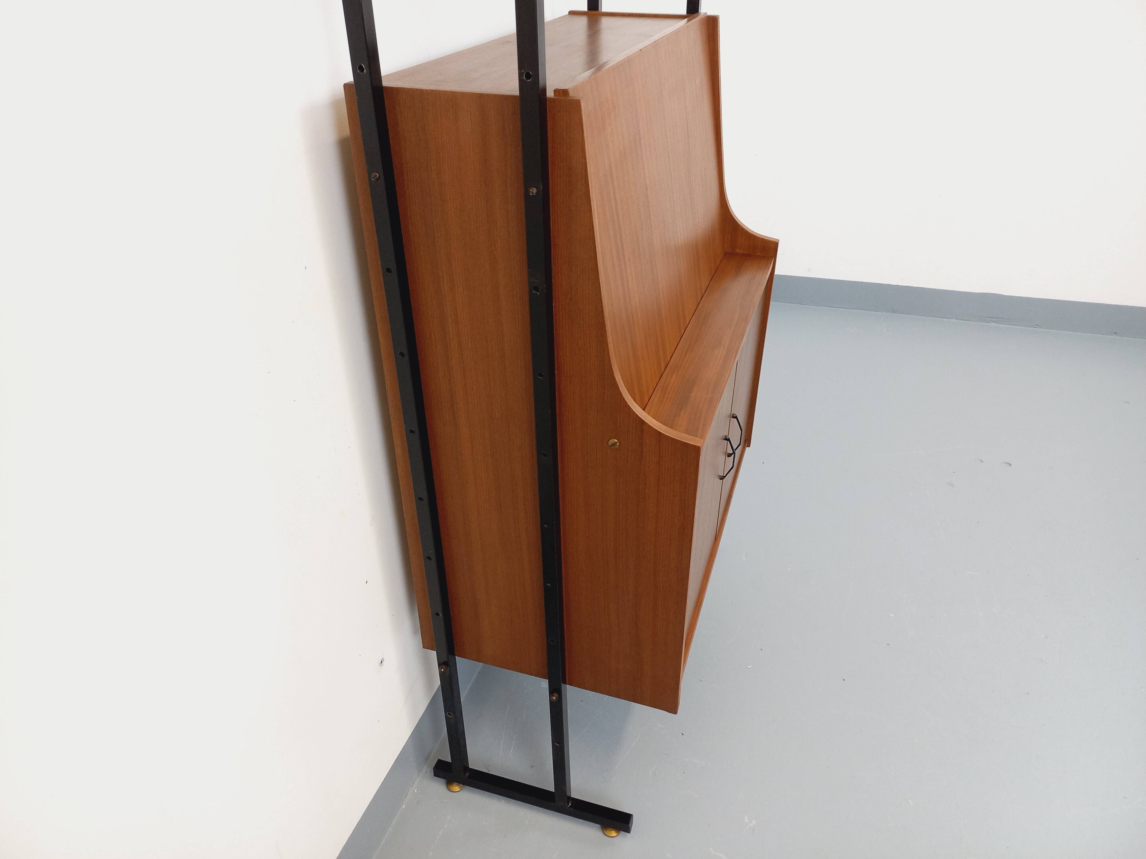 Vintage modular secretary bookshelf in teak and metal.