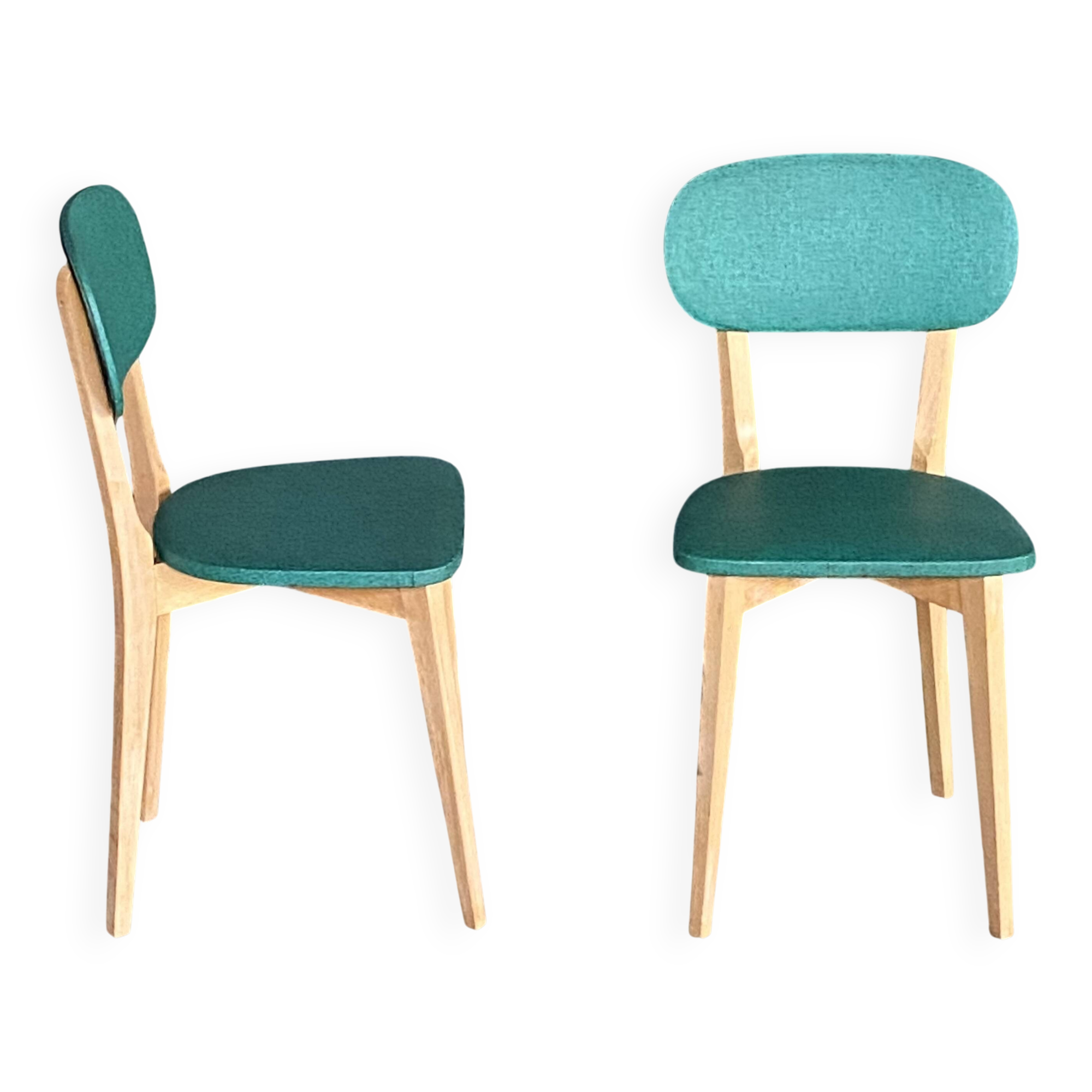 Paire de chaises vintage skaï vert pieds compas