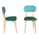 Paire de chaises vintage skaï vert pieds compas