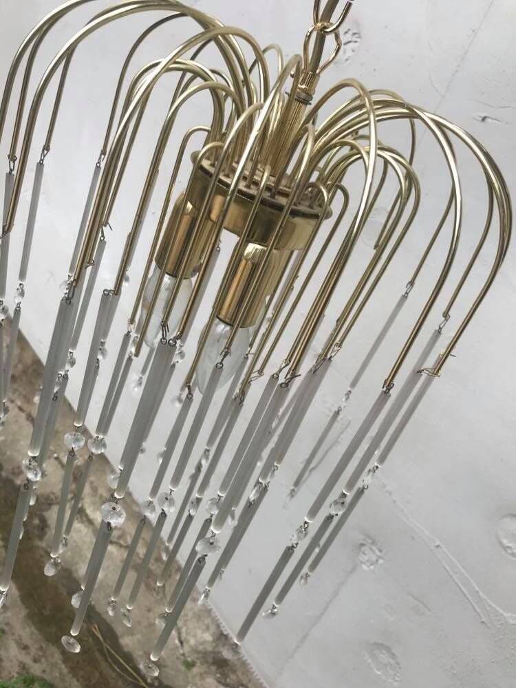 Vintage yellow chandelier in brass and Murano glass, 1970s, cascade style.