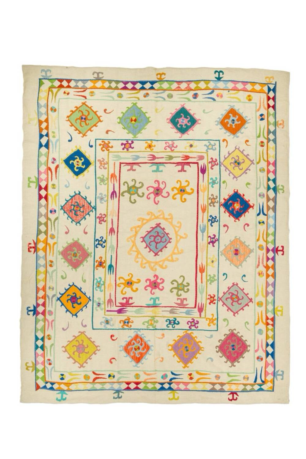 White suzani kilim rug with multi-colored embroidered patterns