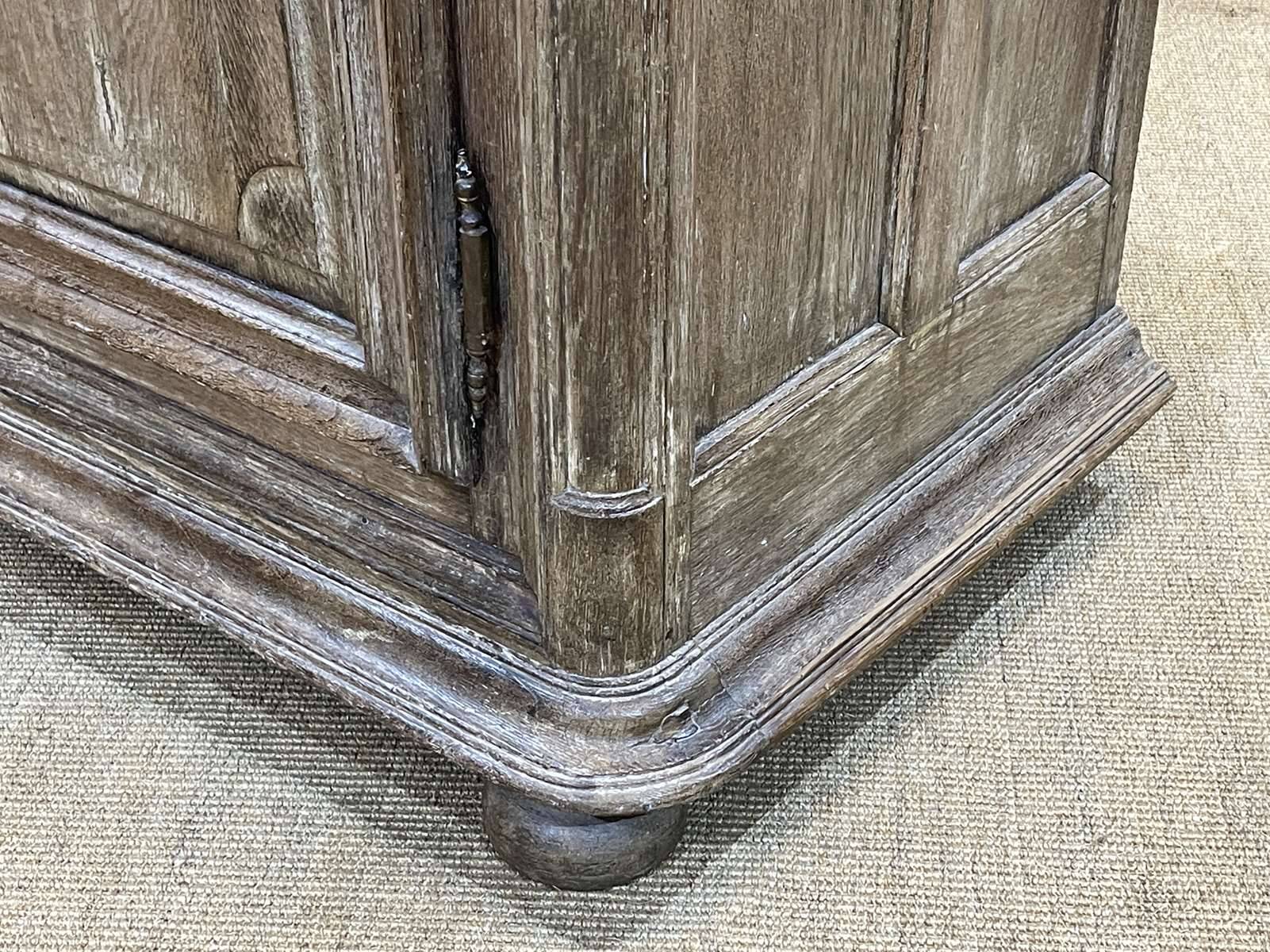 18th-century oak enfilade with a marble-effect painted top.