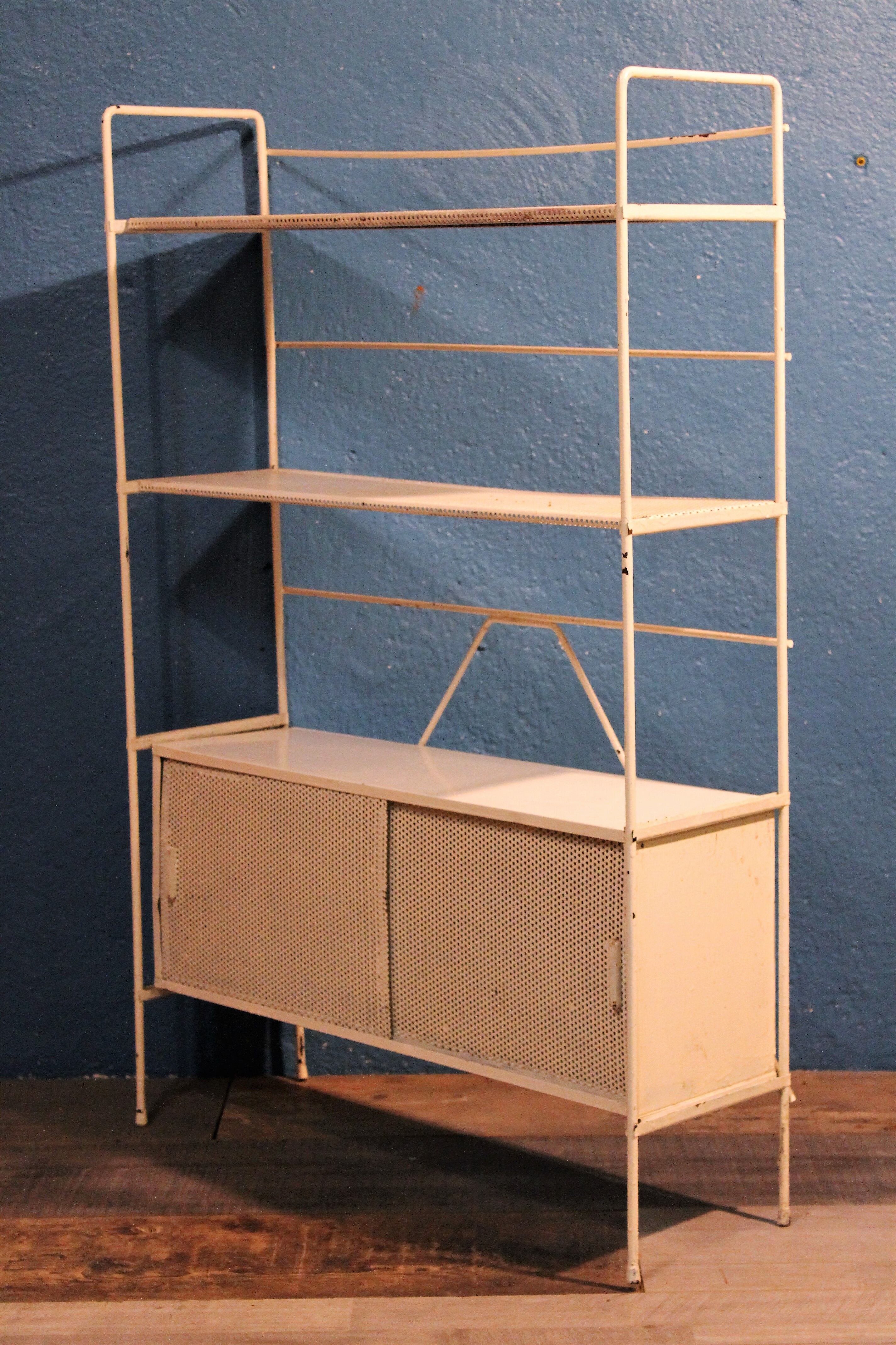 Perforated metal stand 1950
