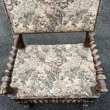 Louis XIII style armchair with twisted backrest and legs.