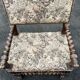 Louis XIII style armchair with twisted backrest and legs.
