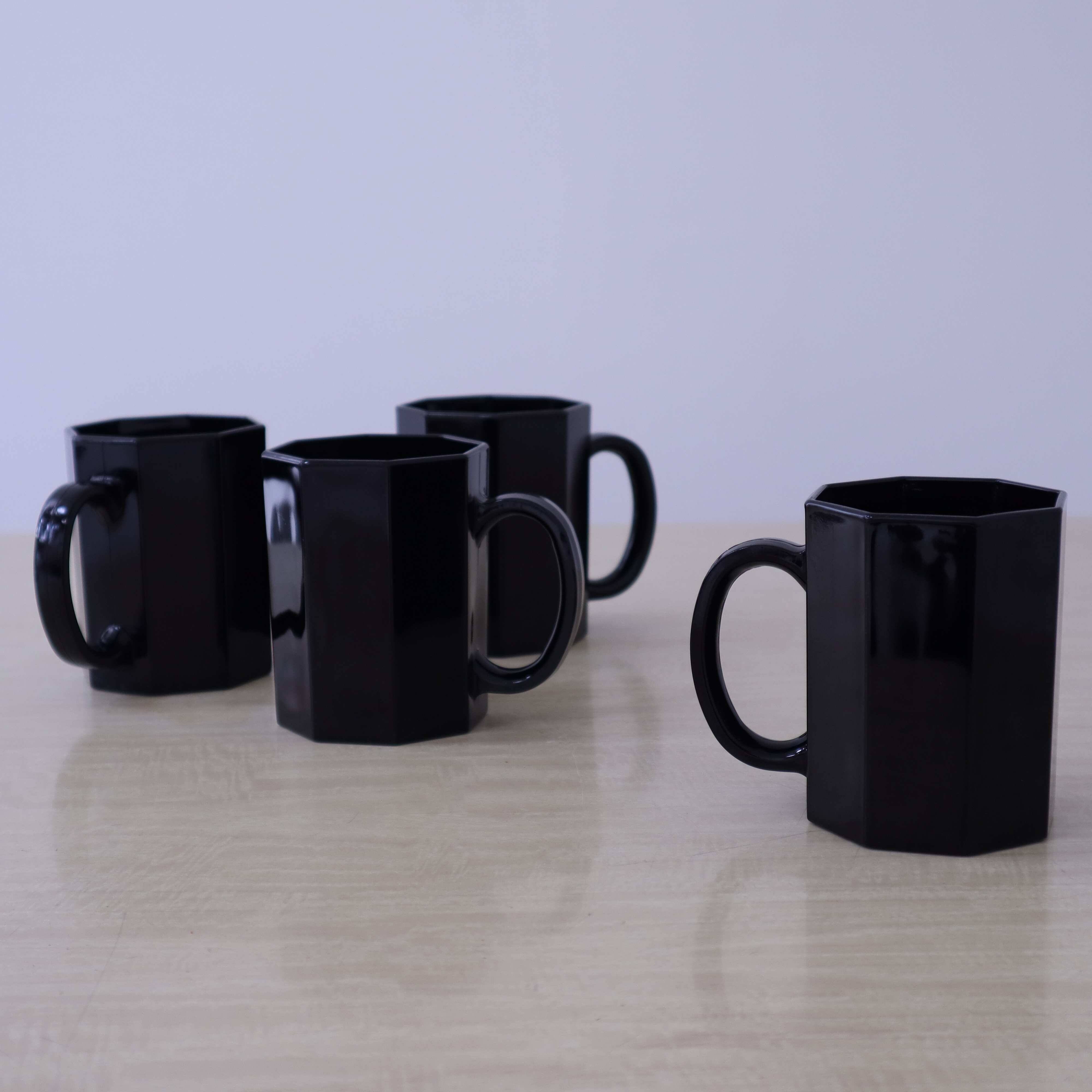 4 black "Octime" Arcoroc mugs