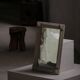 Wall mirror in tramp art style, hand-carved with a painted white frame, early 1900s.