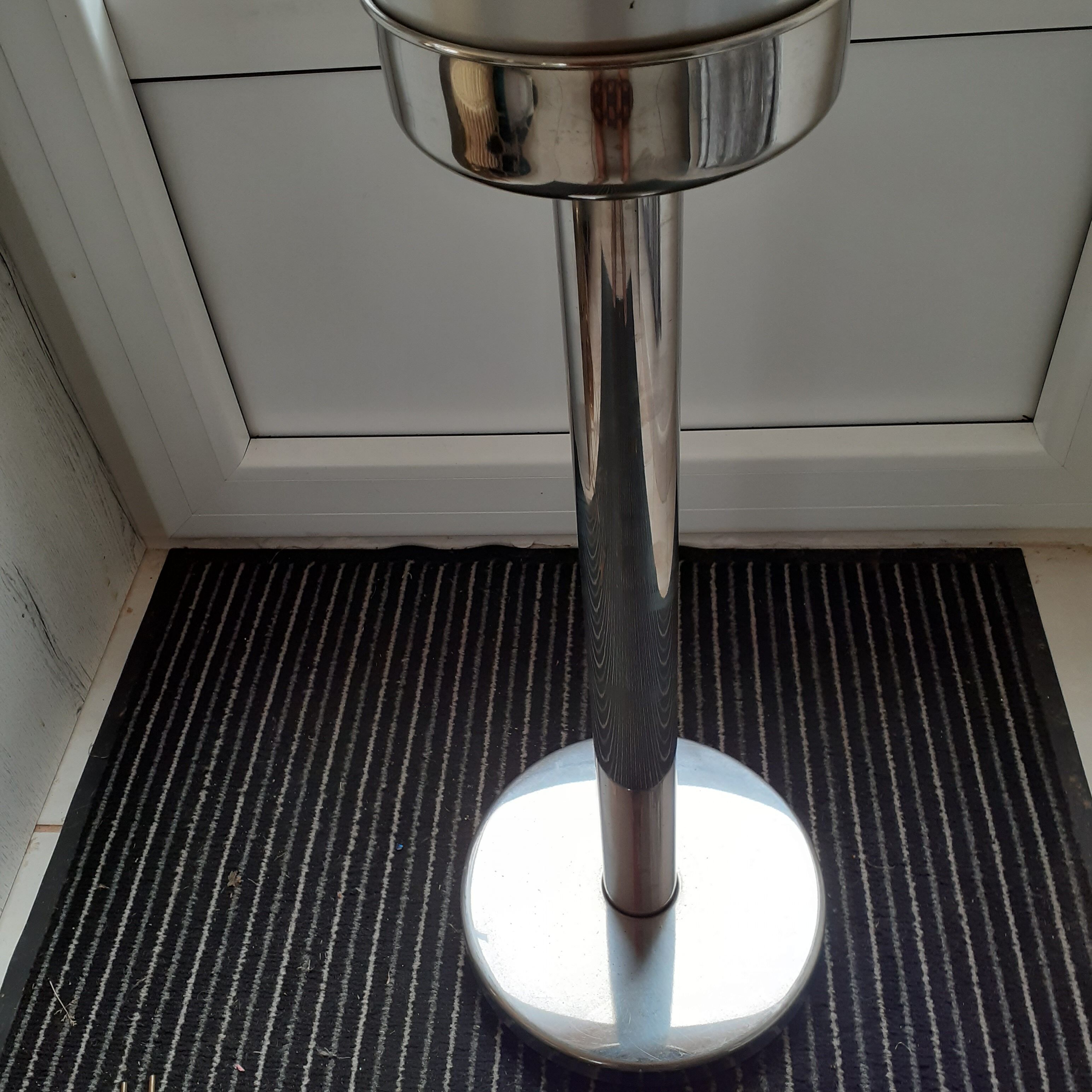 Chrome ice bucket holder.