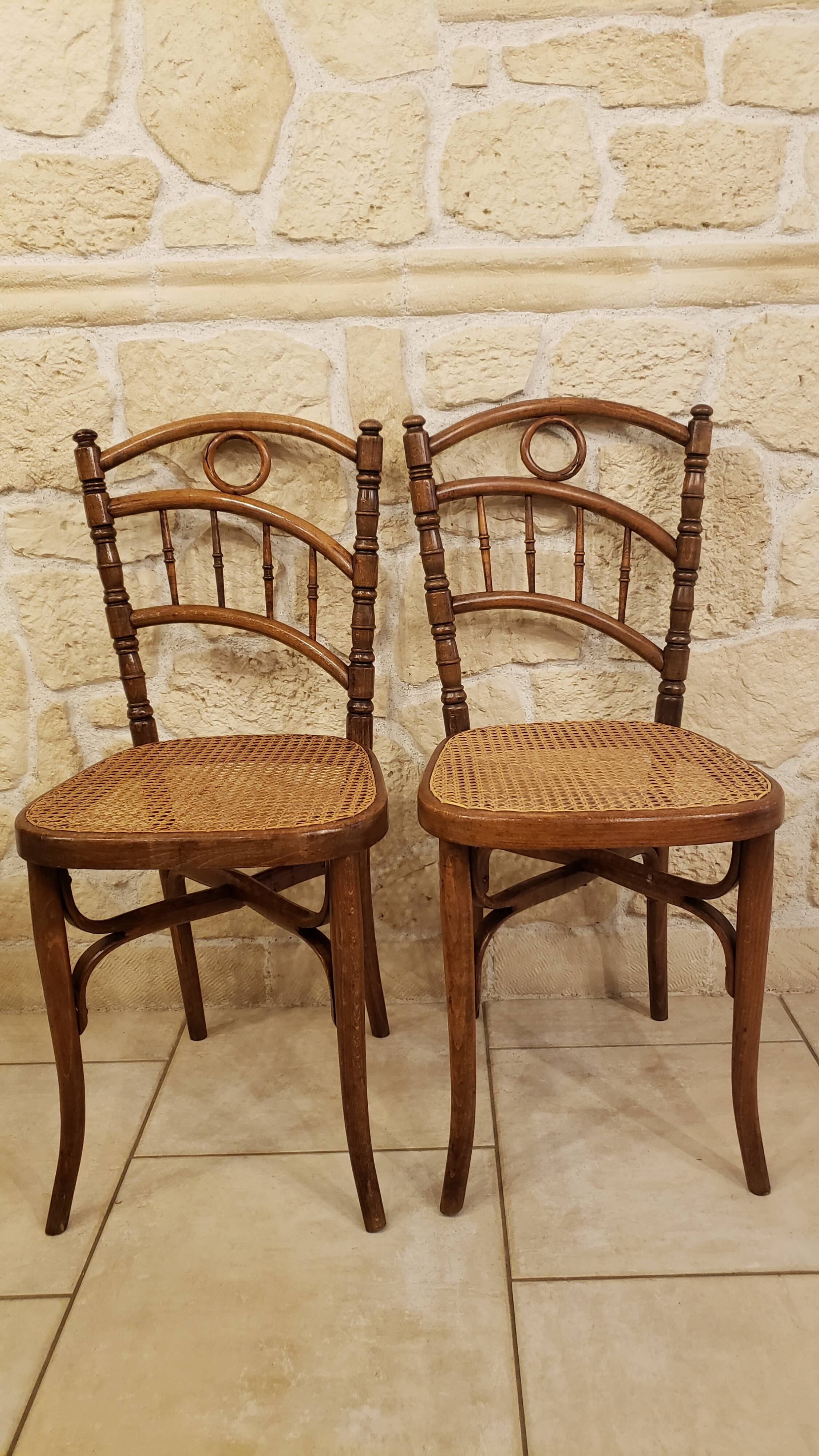 Pairs of old caned bistro chairs cambier n°229