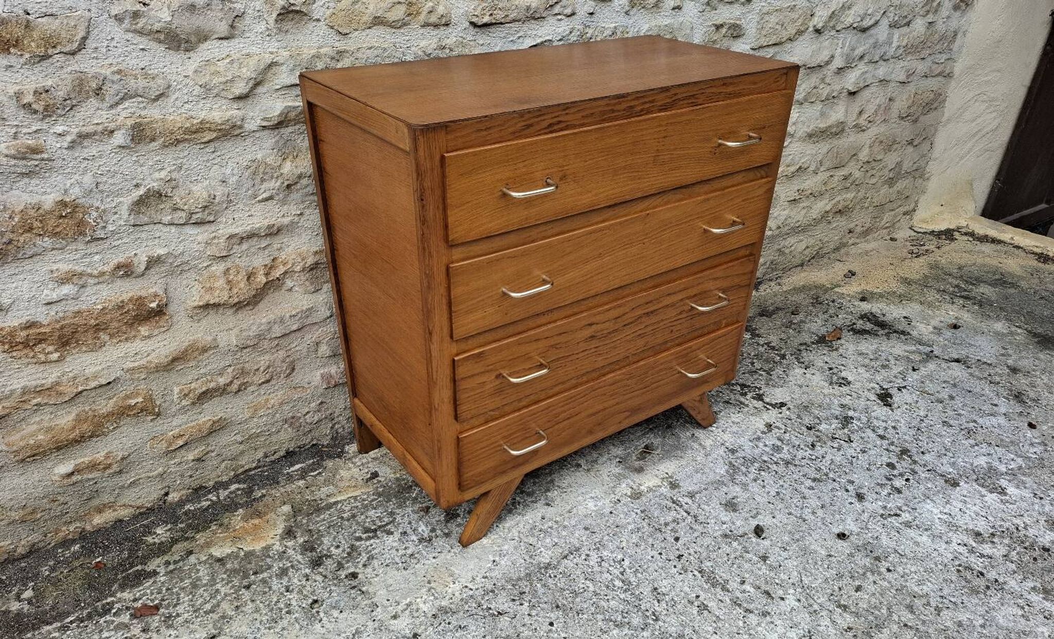 Compass leg chest of drawers