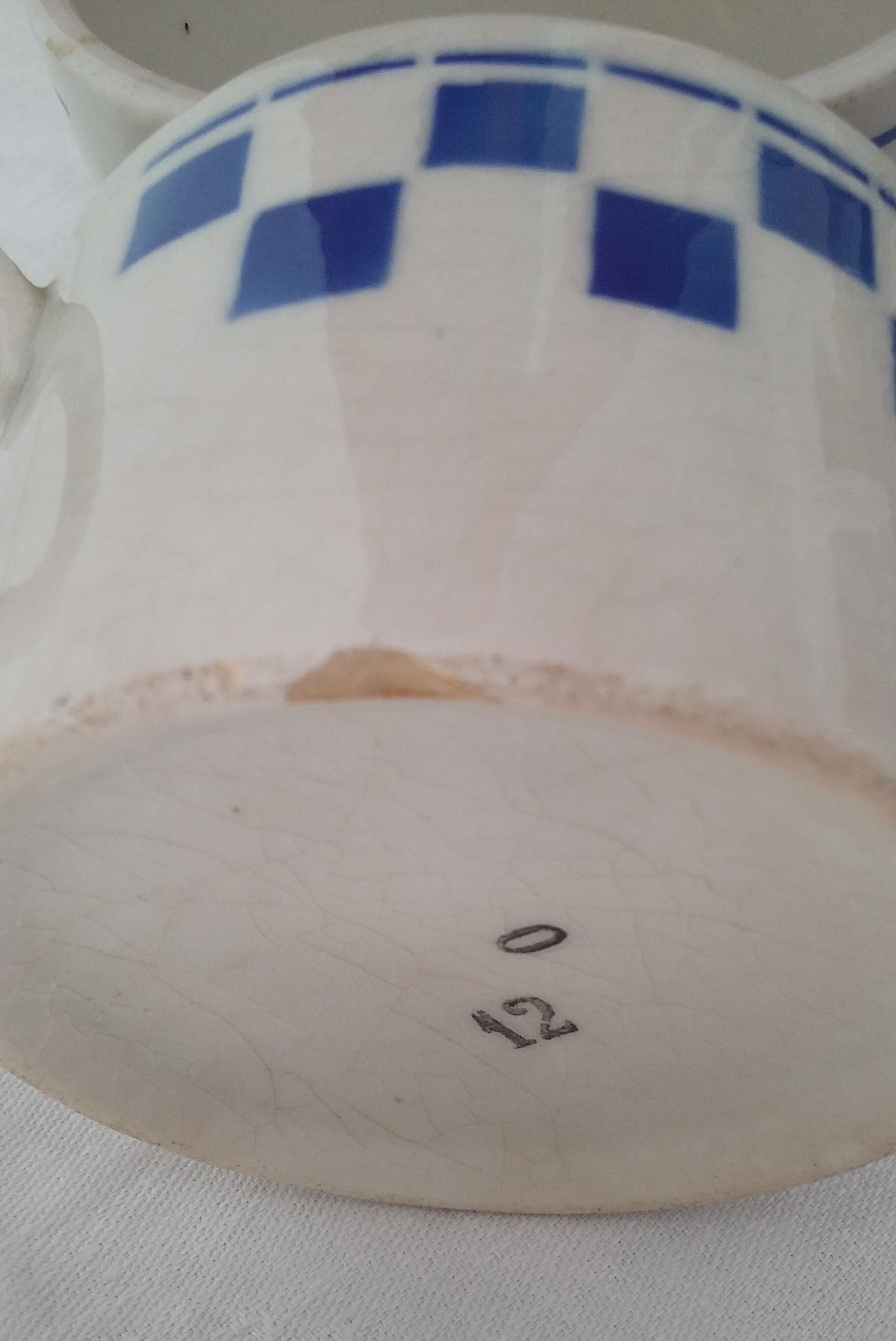 Blue checkerboard cup