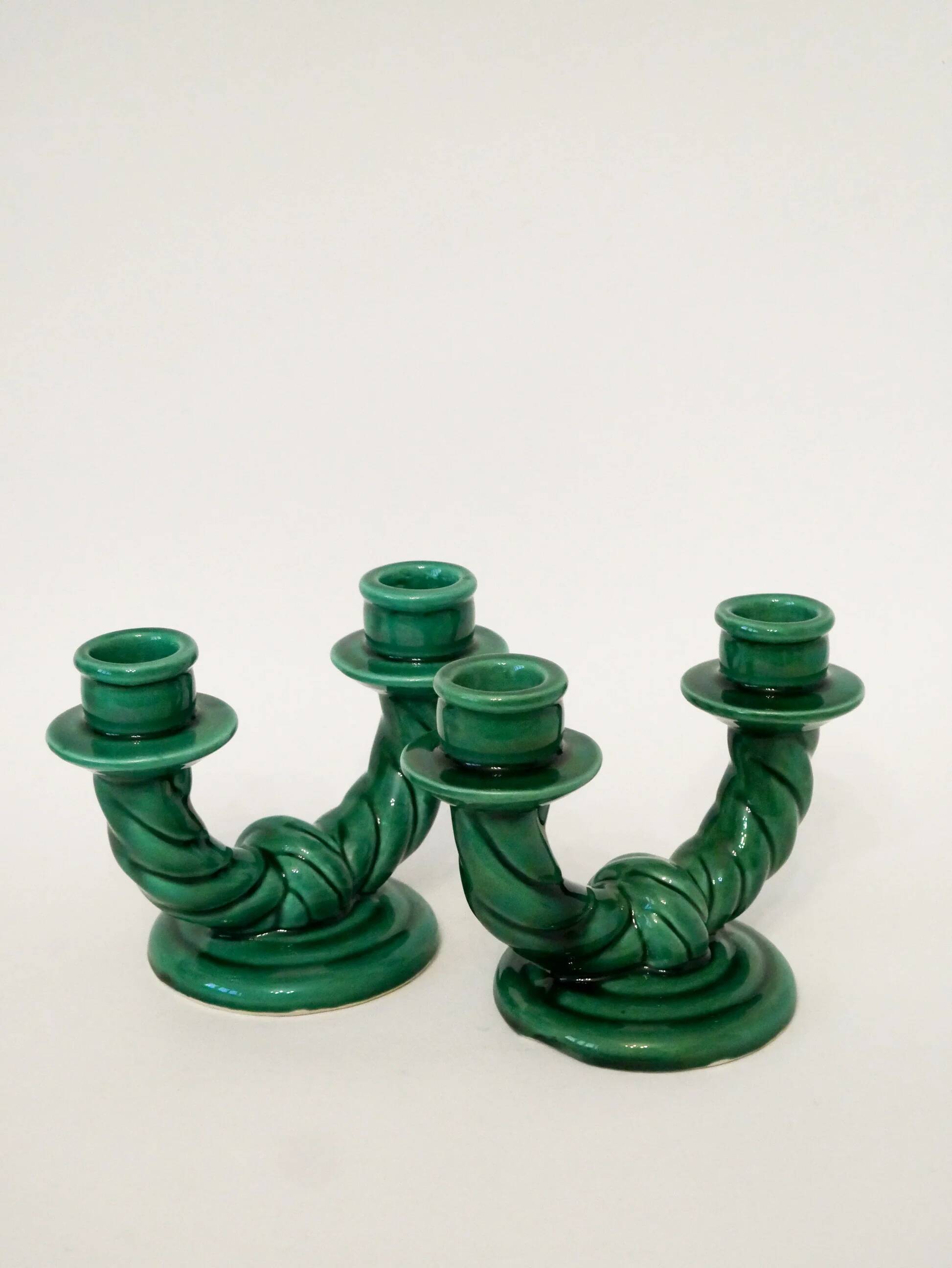 Pair of twisted green ceramic double candlesticks, 1960.