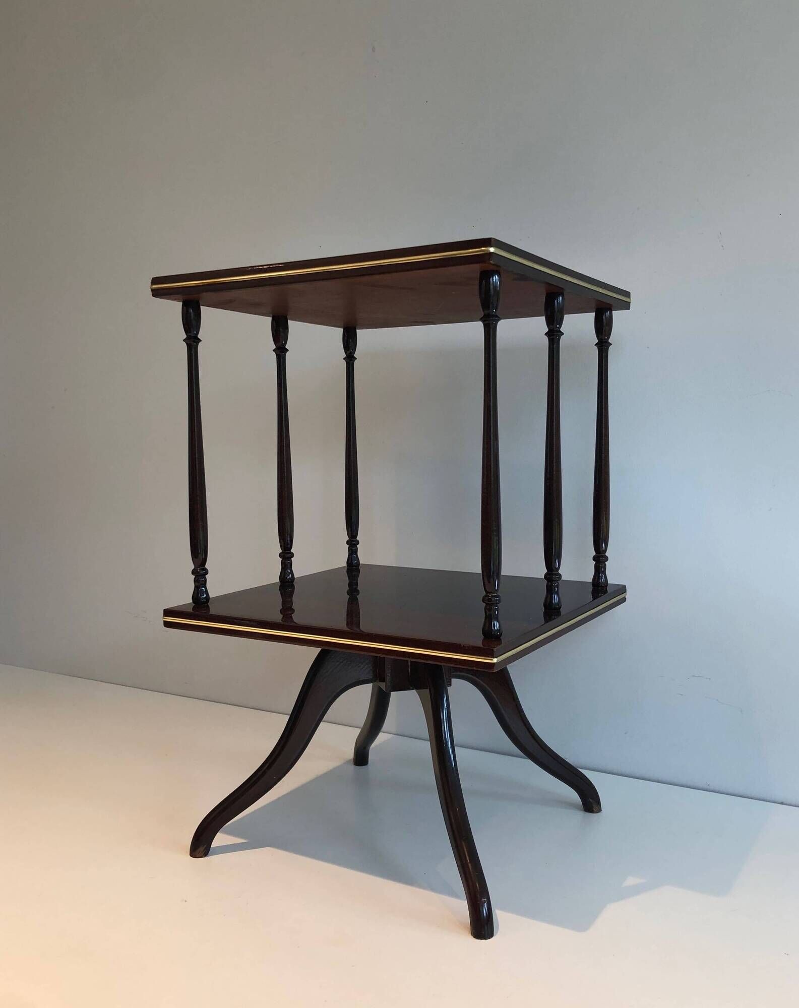 Rotating Table with Two Mahogany and Brass Platforms with Turned Columns.